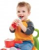 Fisher Price Jeździk muzyczna parada żółty